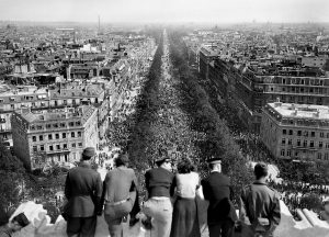Picture dated of May 8, 1945 showing people looking at the crowded Champs Elysees Avenue from the Triumphal Arch (Arc de Triomphe) as Parisians gathered in the streets of Paris to celebrate the unconditionnal German capitulation at the end of the second World War.